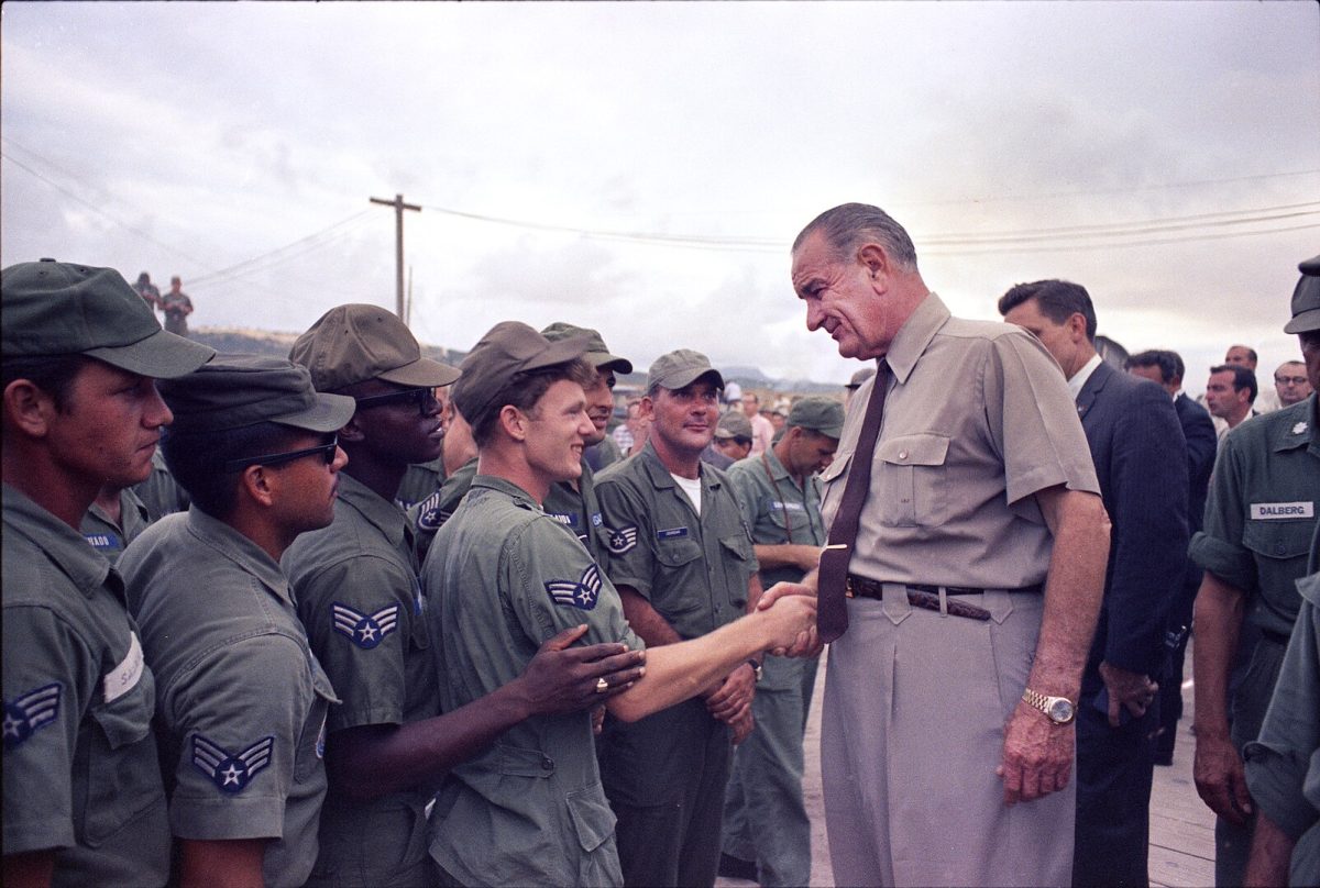 LBJ trousers President Johnson shakes hands with U.S. airmen at Cam Ranh Bay in South Vietnam, c. October 1966